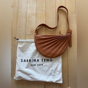 Sabrina Zeng Chiaroscuro Hammock Sling Bag in Caramel Brown